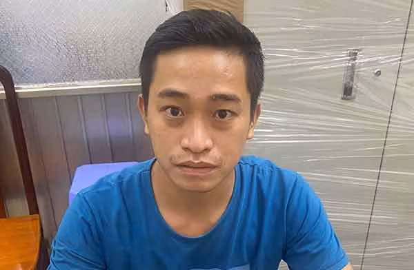 Nguyễn Thành Đạt tại cơ quan công an.