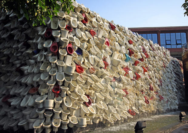 A toilet bowl waterfall is pictured in Shiwan Park in Foshan, Guangdong Province, China. Ten thousand used toilets and washbowls were built into a 100 metre long and 5 metre tall art piece in a Chinese park.