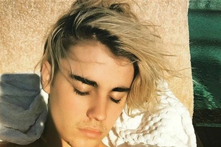 Justin Bieber và những kiểu tóc không -lẫn - vào - đâu