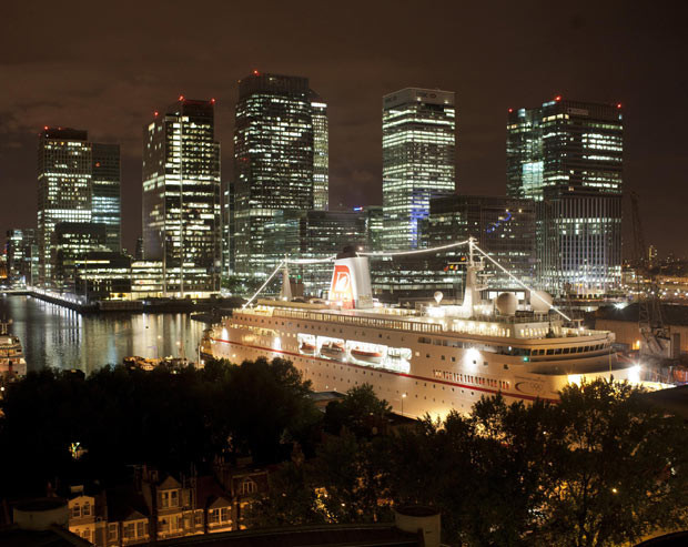 The 175.3m length and 23m beam luxury cruise liner MS Deutschland is seen after it was successfully berthed in South Quay, London Docklands.The German Olympic ship is on a 36-hour test-run ahead of next summer when she will moor at the dock during the Olympics. The lock is 178m in length and 24.4m wide, meaning there was just enough room to fit the vessel and bring her into South Quays deep water berths at the heart of the Canary Wharf financial district.
