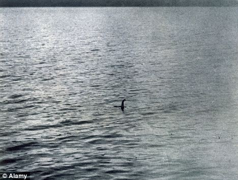 A shadowy image which is allegedly Nessie swimming in Loch Ness Read more: http://www.dailymail.co.uk/sciencetech/article-2013773/Sea-monsters-really-DO-exist-scientists-claim.html#ixzz1S2gksCQn