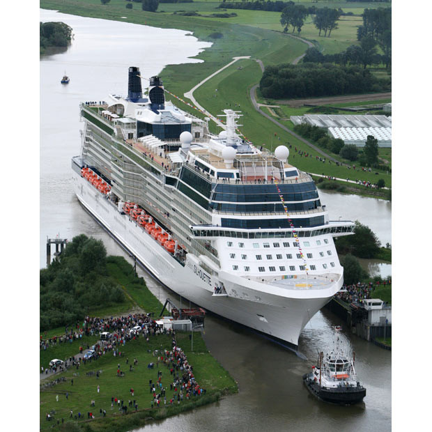 Celebrity Cruises’ new ship Celebrity Silhouette begins its 42km transit backwards down the river Ems near Papenburg, Germany, navigating several narrow gaps with less than 0.75m clearance each side. The transit to the sea takes 12 hours. The ship will be officially launched at its naming ceremony in Hamburg on 21 July .