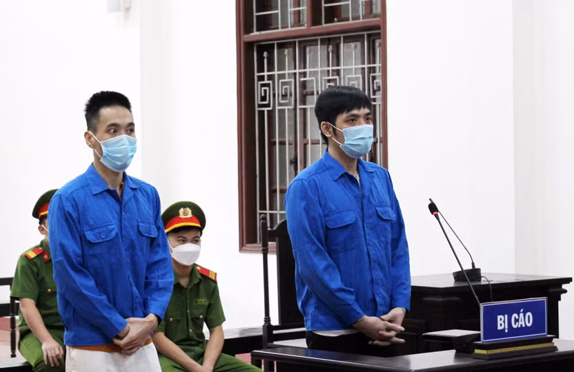Hai bị cáo tại phiên tòa xét xử. Ảnh: P.V.