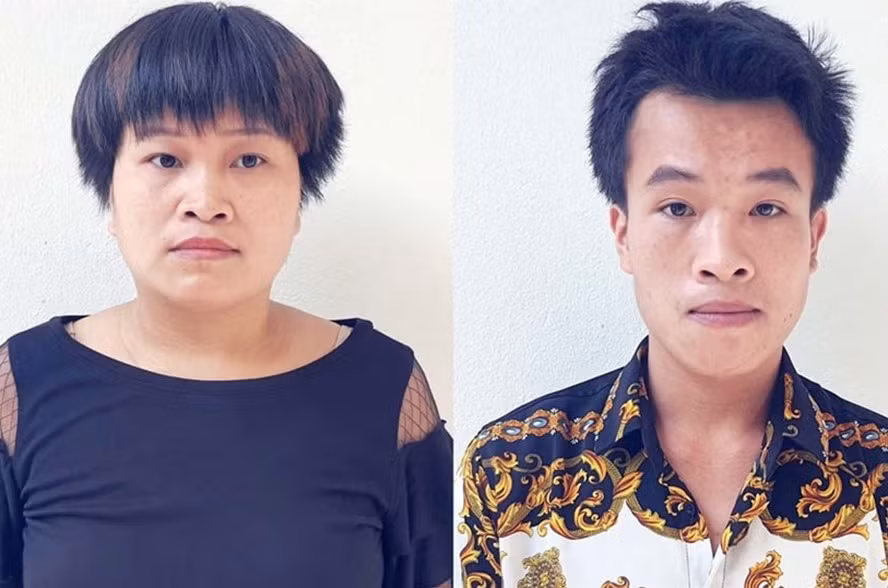 Lê Tiến Nguyện và Lê Thị Thu Trang tại cơ quan chức năng. Ảnh: Trung Dũng.