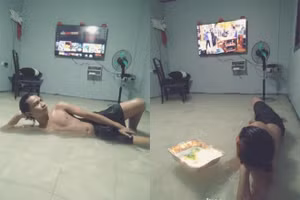 Nhà ngập vẫn thản nhiên xem tivi, chụp ảnh check in