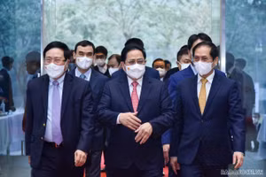 Thủ tướng Chính phủ Phạm Minh Chính và Phó Thủ tướng Thường trực Phạm Bình Minh đến dự Hội nghị. Ảnh: Nguyễn Hồng/Báo Quốc tế.