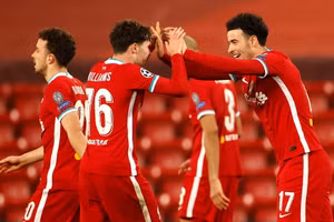 Niềm vui chiến thắng của các cầu thủ Liverpool.