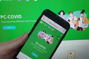 App PC-Covid. Ảnh: Văn Phong.