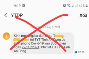 Tin nhắn thông báo người dân đi tiêm vắc xin ngừa COVID-19. Ảnh: H.N.