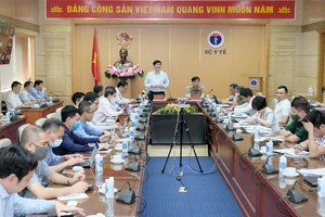 Hội nghị trực tuyến quán triệt việc "làm sạch" dữ liệu tiêm chủng COVID-19 và hướng dẫn triển khai các nhiệm vụ của Tổ Công tác triển khai Đề án 06 do hai Bộ Y tế và Bộ Công an phối hợp tổ chức. Ảnh: Trần Minh.