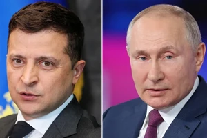 Tổng thống Nga Putin và Tổng thống Ukraine Zelensky (trái).