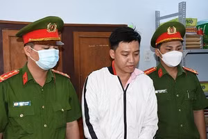 Nguyễn Thành Tâm tại cơ quan công an.