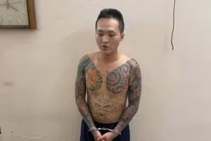 Trần Văn Cao tại cơ quan công an. Ảnh: V.C.