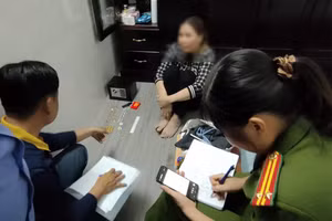 Bà P.T.Đ. làm việc với cơ quan công an.