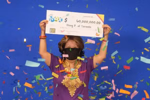 Bà Pravatoudom trúng giải 60 triệu USD sau 20 năm kiên trì mua một dãy số.