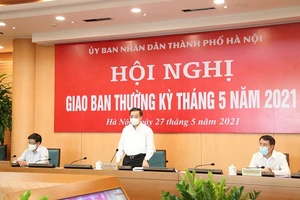 Chủ tịch UBND TP. Chu Ngọc Anh chủ trì họp giao ban UBND TP. Hà Nội tháng 5. Ảnh: Gia Huy
