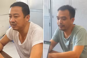 Hồ Sỹ Vọng và Nguyễn Hữu Thủy tại cơ quan công an. (Ảnh: CANA)