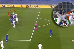 Bàn gỡ hoà gây tranh cãi của Benzema cho Real Madrid trước Chelsea.