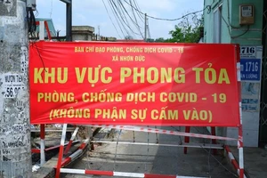 Khu vực phong tỏa phòng chống dịch Covid-19 khi có ca nhiễm tại Xã Nhơn Đức- huyện Nhà Bè. (Ảnh: HCDC).