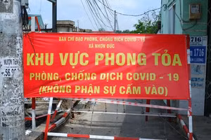 Khu vực phong tỏa phòng chống dịch Covid-19 khi có ca nhiễm tại Xã Nhơn Đức- huyện Nhà Bè. (Ảnh: HCDC).