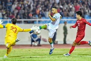 Đội tuyển Việt Nam (áo sẫm) thua Iraq 0-1 tại sân Mỹ Đình trong trận lượt đi vòng loại thứ 2 World Cup 2026 khu vực châu Á. Ảnh: INT.