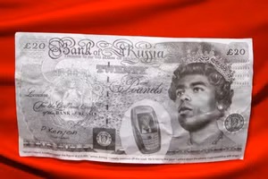 Người hâm mộ Arsenal ném những đồng tiền giả có khuôn mặt Cole...