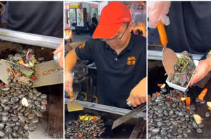 Món ăn đường phố mới nhất ở Trung Quốc liên quan đến đá không ăn được. Ảnh: Johannes Maria / Twitter.