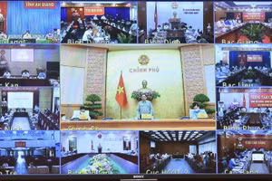 Sáng 9/10, Thủ tướng Chính phủ Phạm Minh Chính, Trưởng Ban Chỉ đạo quốc gia phòng chống COVID-19 chủ trì cuộc họp trực tuyến toàn quốc của Ban Chỉ đạo với các địa phương. Ảnh: VGP