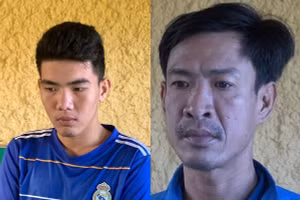 Đặng Văn Thành và Lê Thành Quang tại cơ quan công an.