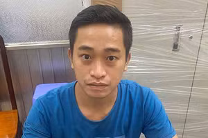 Nguyễn Thành Đạt tại cơ quan công an.