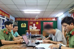 Anh B.M.T. làm việc với cơ quan công an.