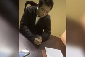 Lê Ngọc Quốc Anh tại cơ quan công an.