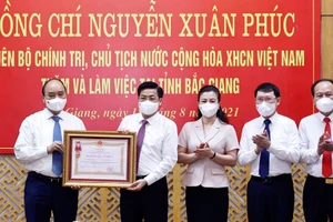 Bắc Giang là tỉnh đầu tiên vinh dự được Chủ tịch nước tặng thưởng về thành tích trong công tác phòng chống dịch Covid-19 (Ảnh: BBG).