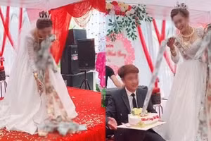 Xuýt xoa cô dâu trẻ đeo đầy vàng, còn được chồng tặng bánh kem "ngập" tiền