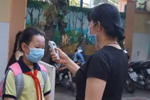 Học sinh TP.HCM trở lại trường sau thời gian nghỉ phòng dịch Covid-19 năm học 2020-2021. Ảnh minh họa 