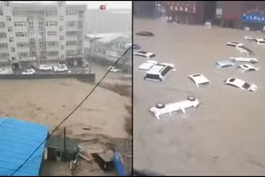 Video nước ngập tới bụng người đi tàu điện ngầm Trung Quốc