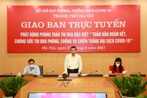 Chủ tịch UBND TP Hà Nội Chu Ngọc Anh phát động phong trào thi đua đặc biệt “Toàn dân đoàn kết chung  sức thi đua phòng, chống và chiến thắng dịch Covid-19”.