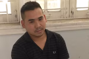 Đối tượng Trần Văn Đạo tại cơ quan công an. Ảnh: Công an.