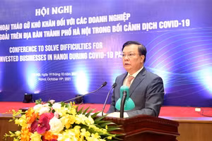 Ông Đinh Tiến Dũng, Ủy viên Bộ Chính trị, Bí thư Thành ủy Hà Nội phát biểu.