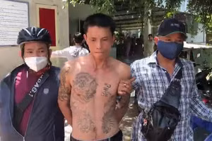 Đối tượng Thế bị công an bắt giữ.
