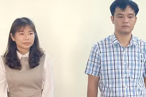 Bị can Lý Thị Minh và Nguyễn Văn Hùng.