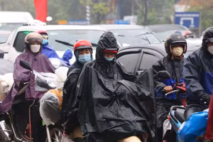 Các tỉnh Bắc Bộ nhiệt độ tăng nhẹ, trời rét; sáng và đêm có xuất hiện mưa nhỏ, mưa phùn rải rác. Ảnh minh hoạ.