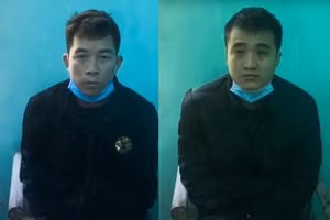 Hai đối tượng Đinh Thế Anh và Hoàng Hồng Thái tại cơ quan chức năng.