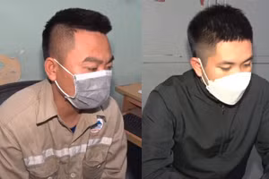 Nguyễn Văn Linh (trái) cùng Nguyễn Xuân Quang tại cơ quan điều tra.