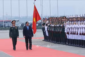 Thủ tướng Phạm Minh Chính đến dự Lễ khai mạc Triển lãm Quốc phòng quốc tế 2022. Ảnh: Trọng Đức/TTXVN