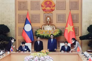 Bộ trưởng Bộ Giáo dục và Đào tạo Việt Nam Nguyễn Kim Sơn và Bộ trưởng Bộ Giáo dục và Thể thao Lào Phout Simmalavong ký kết Kế hoạch hợp tác về giáo dục năm 2022.