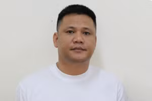 Trịnh Công Chính tại cơ quan điều tra. Ảnh: CANA