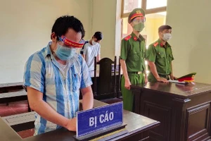 Bị cáo Nguyễn Quang Duy tại phiên tòa xét xử. Ảnh: Công an Bình Phước.