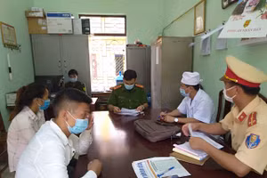 Cơ quan chức năng làm việc với Nông Văn Quốc.