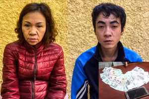 Trịnh Kim Tuyết và Phạm Văn Dũng cùng tang vật của vụ án. Ảnh: Công an Hà Nội.